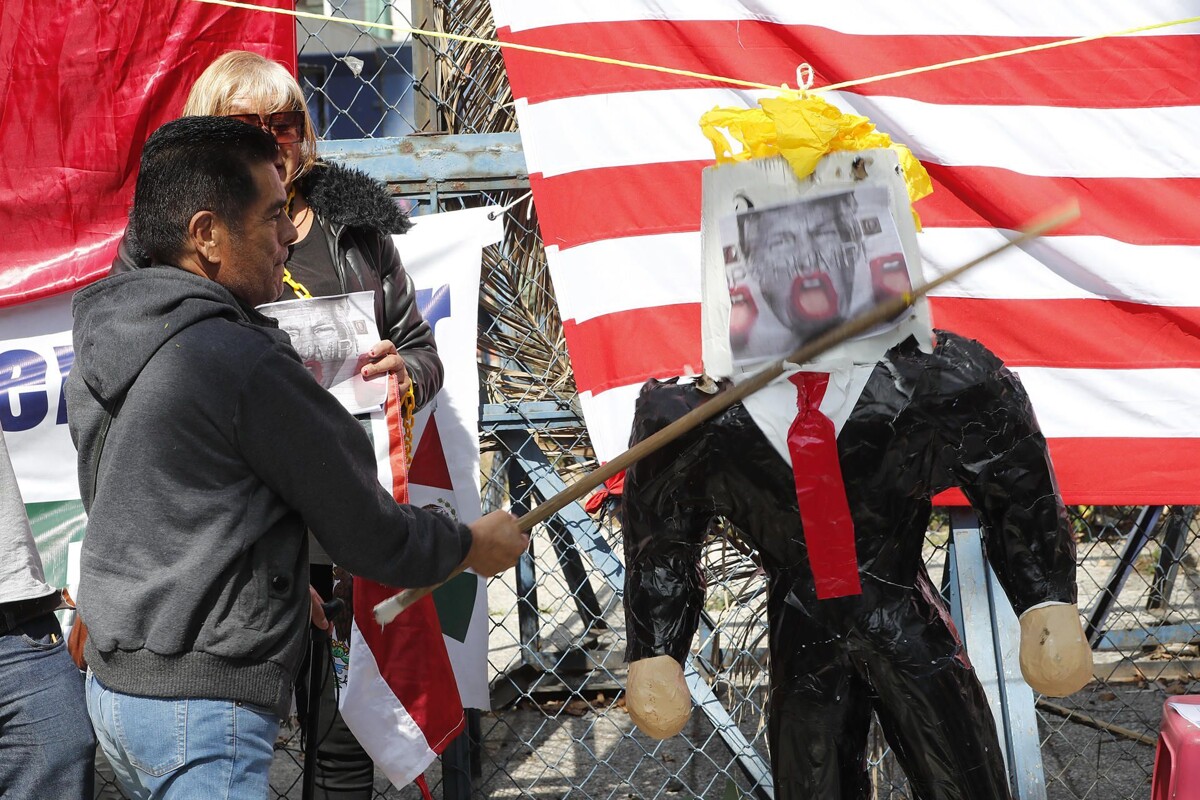 Migrants Unite Against Trump Policies in Mexico City