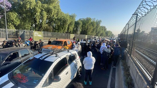Protests in Mexico City Over Arrest of Gang Leader
